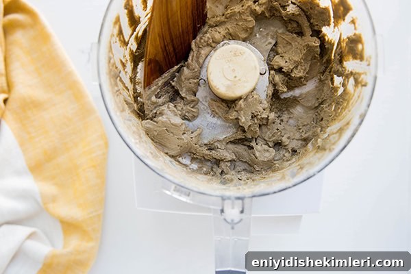 Make Your Own Probiotic Toothpaste for Healthier Gums and Teeth 7 adding water while blending