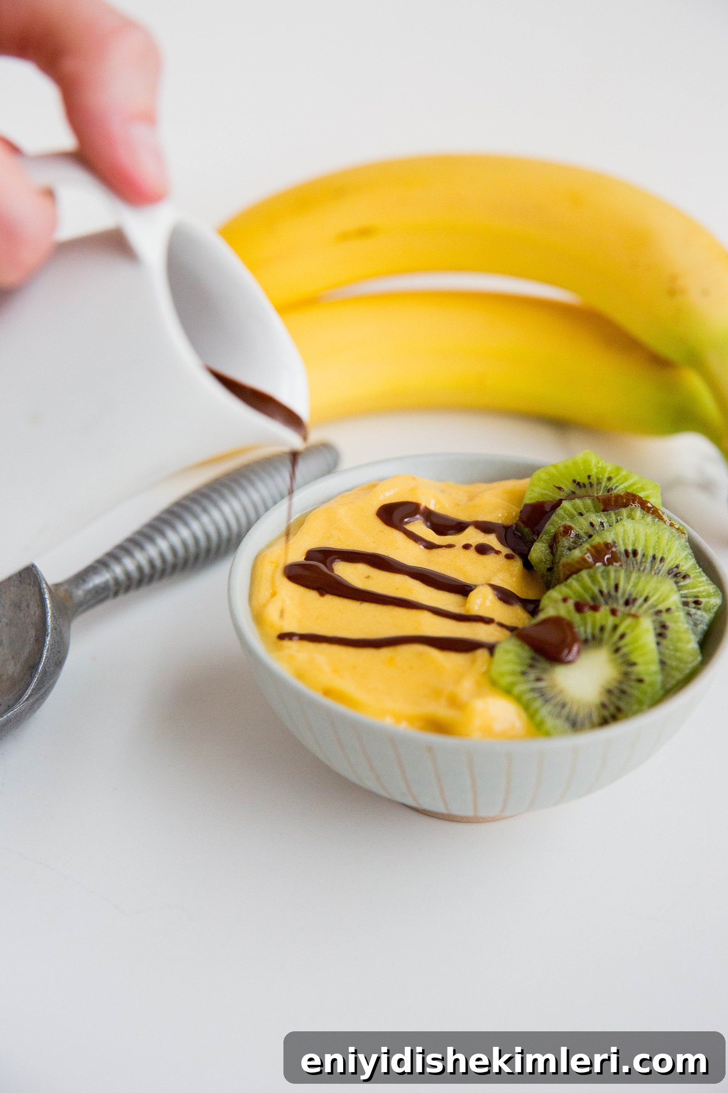 Mango Banana Nice Cream Recipe — Creamy Dairy-Free Mango Banana Dessert 7 Finished mango banana nice cream with toppings